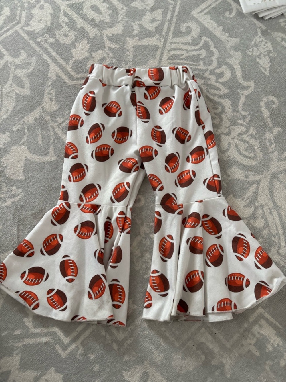 Girls White Football Print Ruffle Bell-Bottom Pants